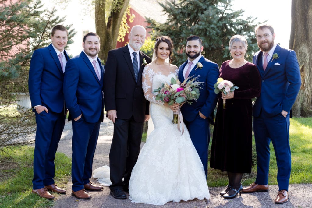 bride and groom with grooms family