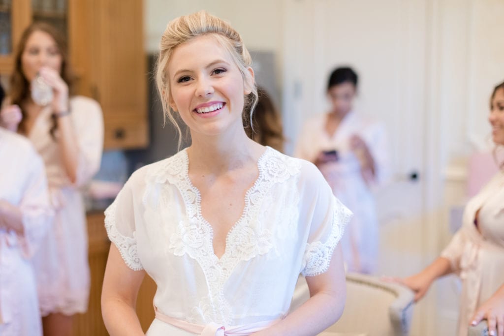 bride in her wedding day robe, bridal preparations 