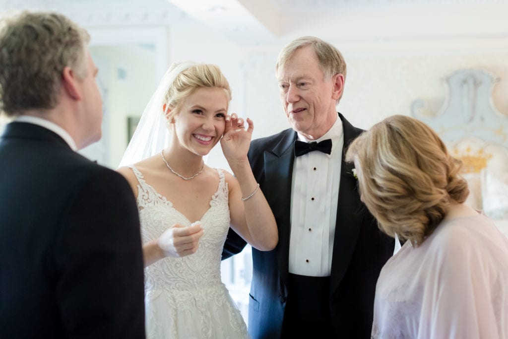 emotional moment with bride and her parents