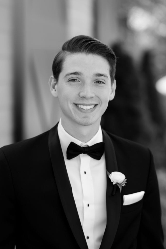 black and white portrait of groom