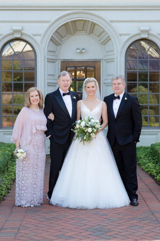 bride with her family on wedding day