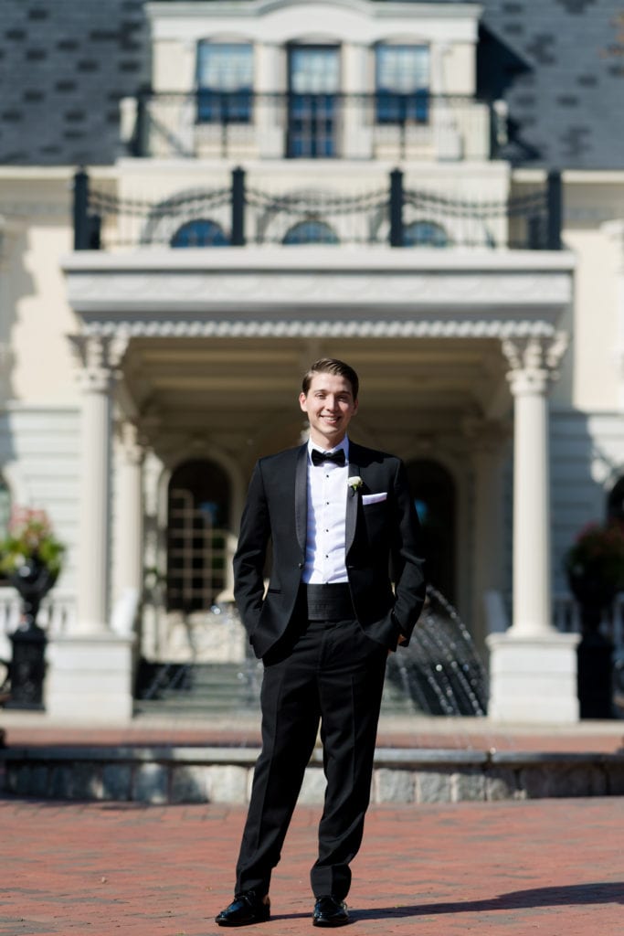 groom in Ozzy's Tux outside of Ashford Estate