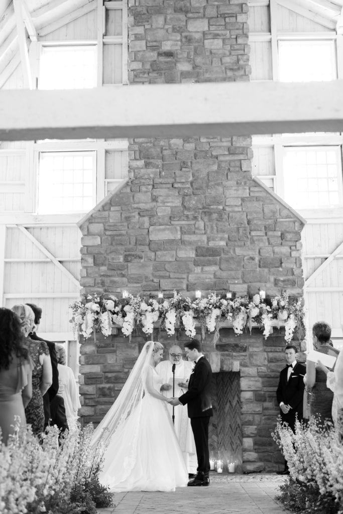 bride and groom at the altar on their wedding day