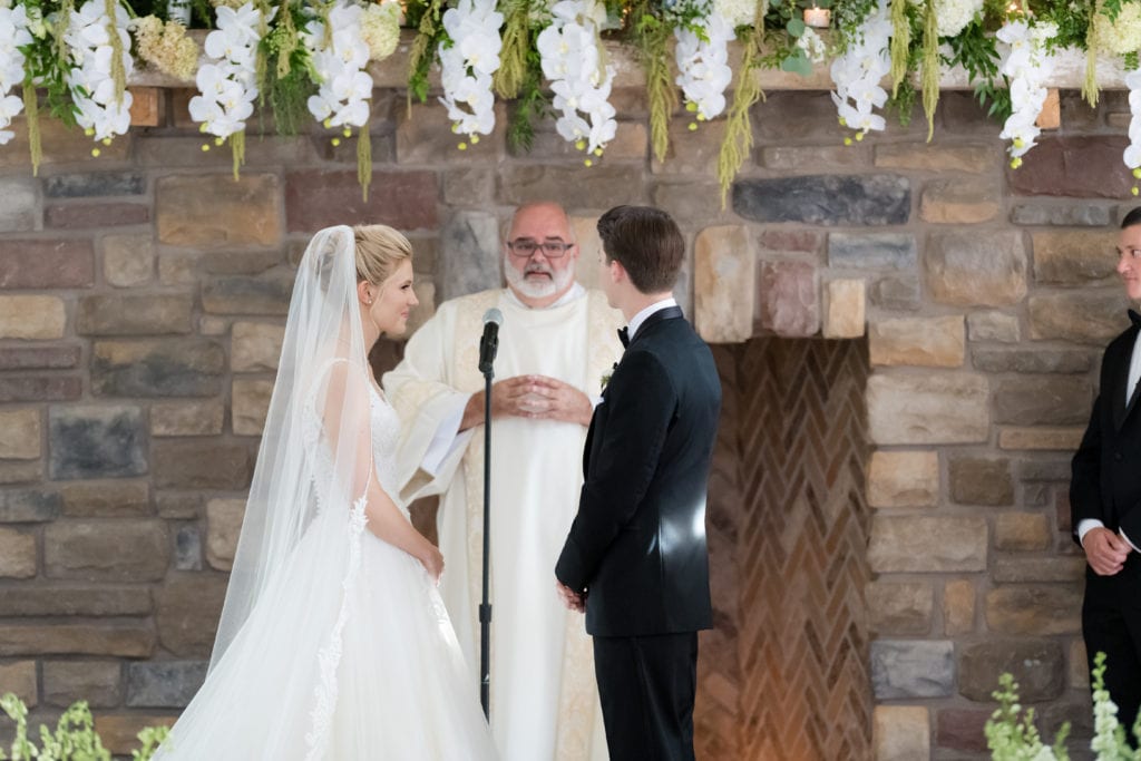 bride and groom exchanging vows