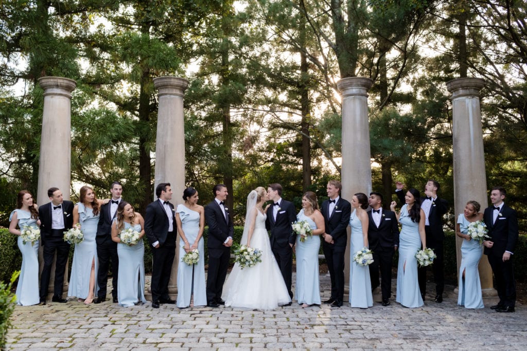 bride and groom with their wedding party