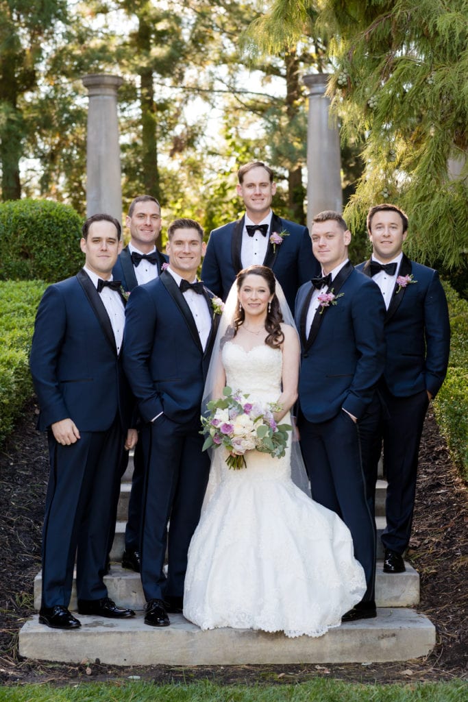 bride and groom with groomsmen