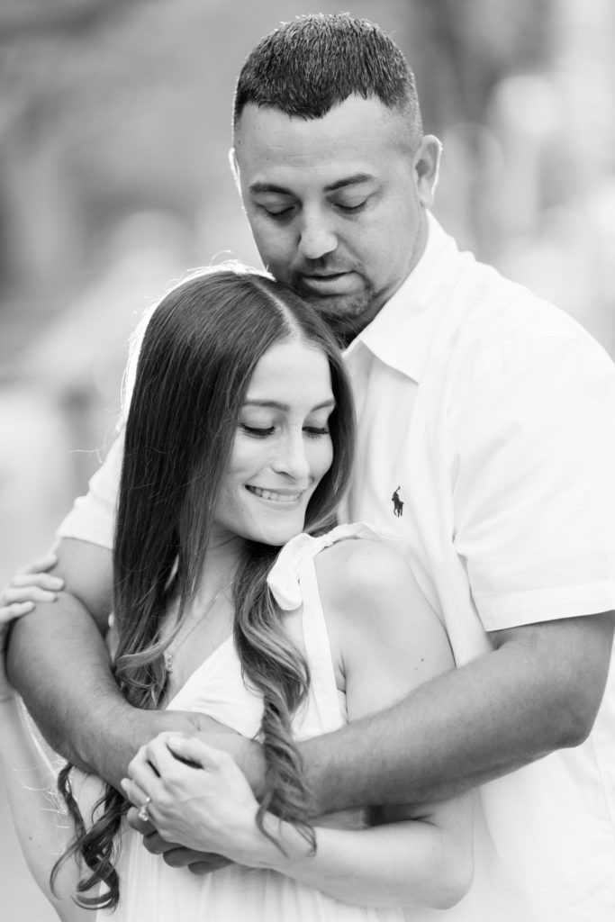 Black and white photo of engaged couple