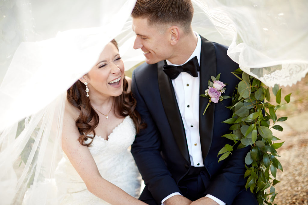 happy bride and groom on wedding day. Photo by Vanessa Joy Photography.