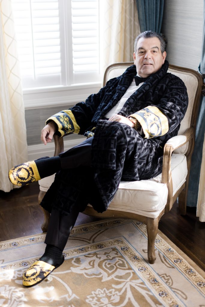 Groom's father in his wedding day robe, groom's preparations