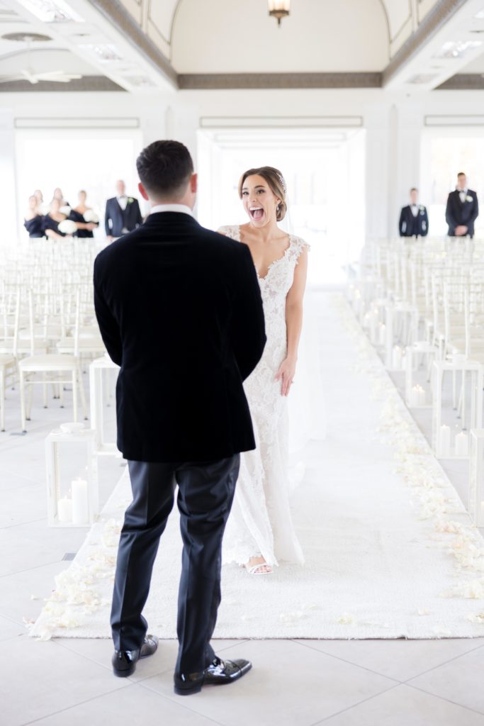 bride is excited to see groom on their wedding day