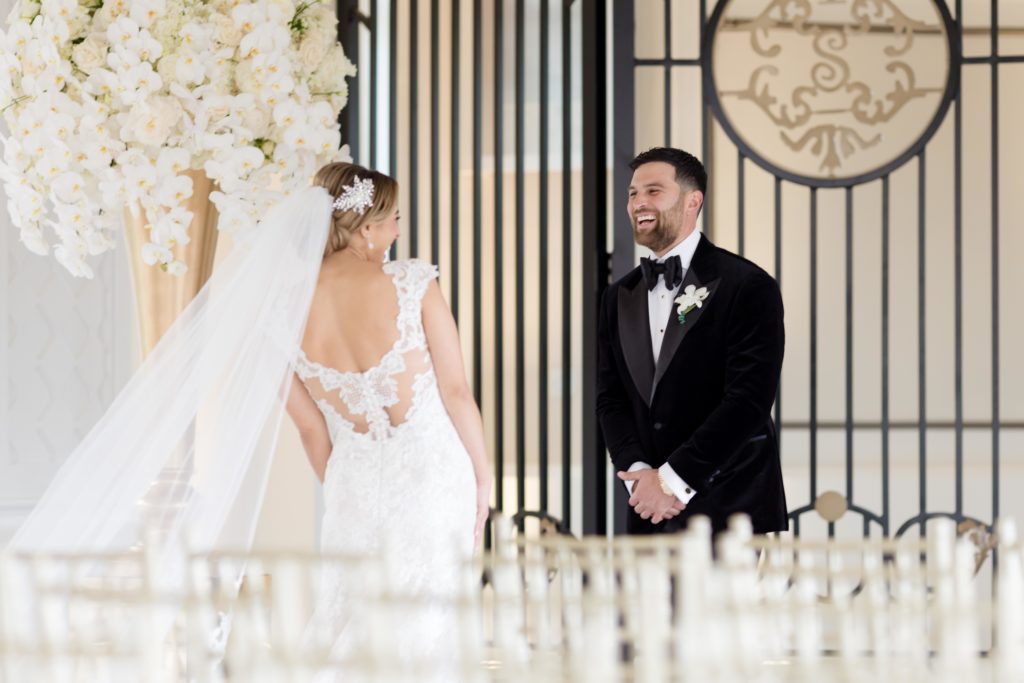 groom is estatic for first look with his bride