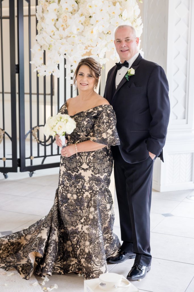 Bride's family, floral dress, classic tux