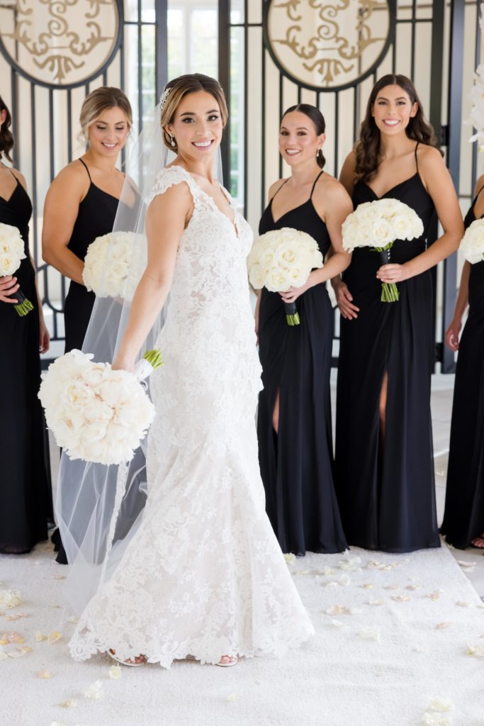 bride shows off her beautiful Maggie Sottero Designs wedding gown