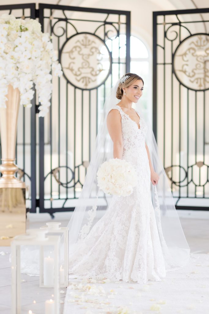 Bride is exquisite in Maggie Sottero Designs wedding gown from Kleinfeild Bridal 