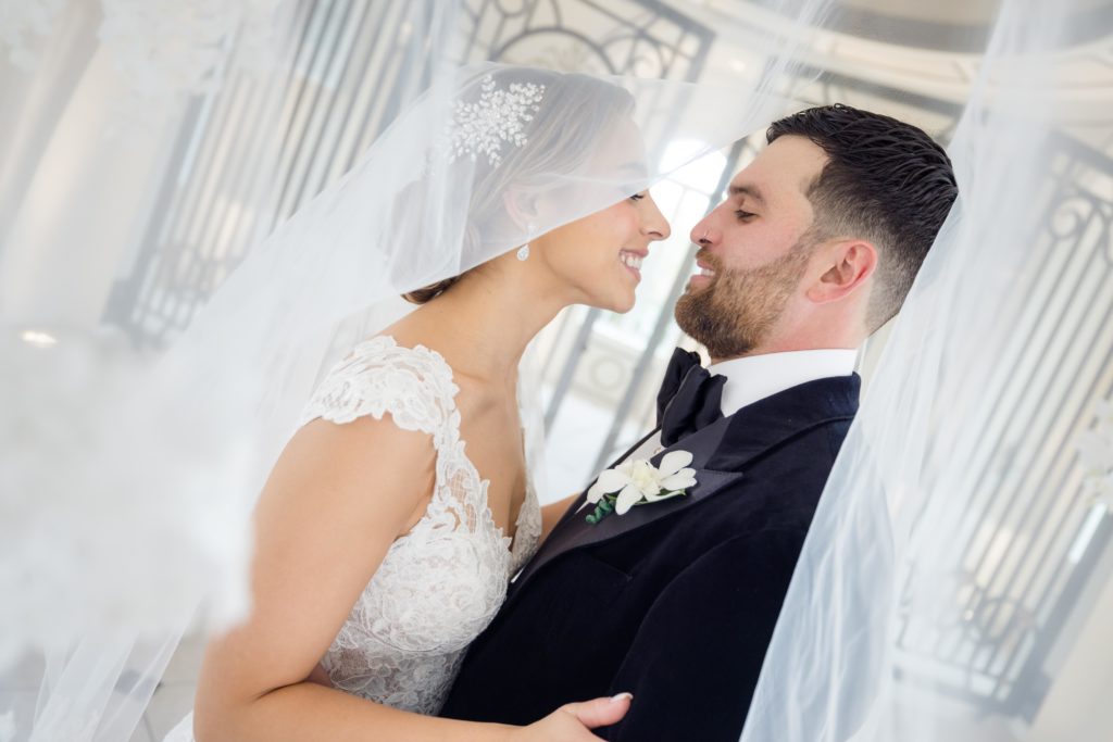 wedding portraits, Maggie Sottero Designs wedding gown, lace-edged veilclassic tux