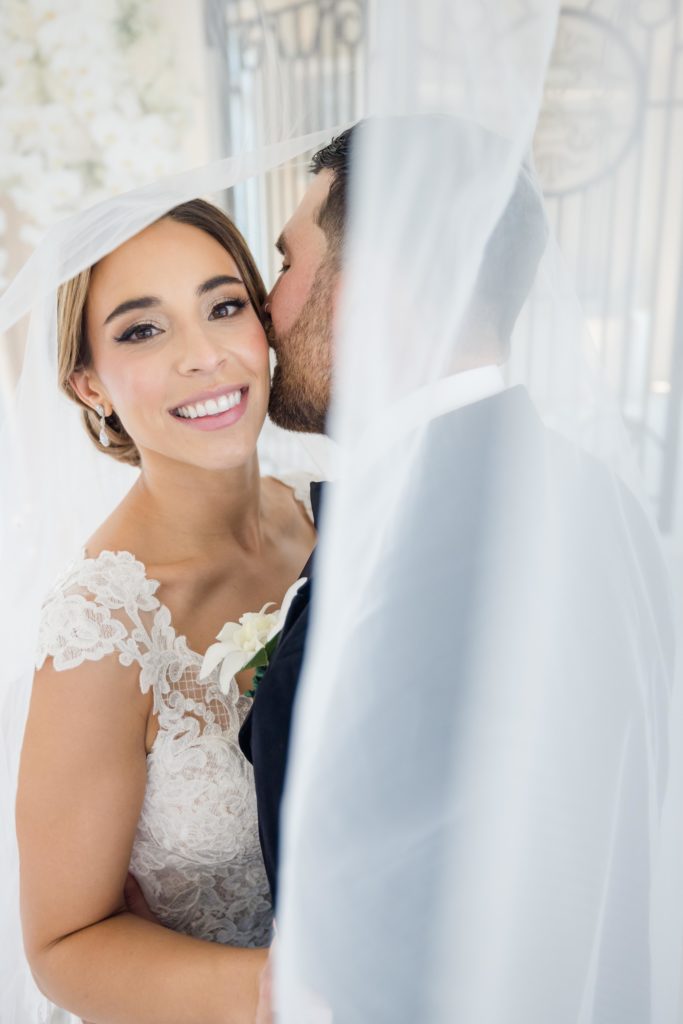 wedding portraits, Maggie Sottero Designs wedding gown, lace-edged veilclassic tux