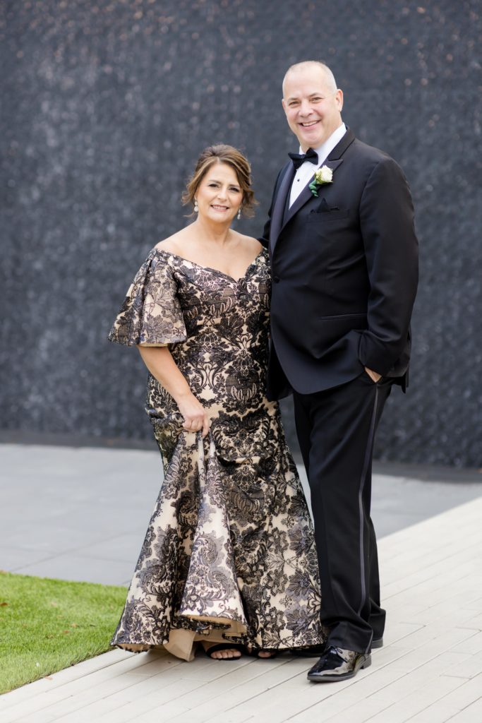 Bride's family, floral dress, classic tux