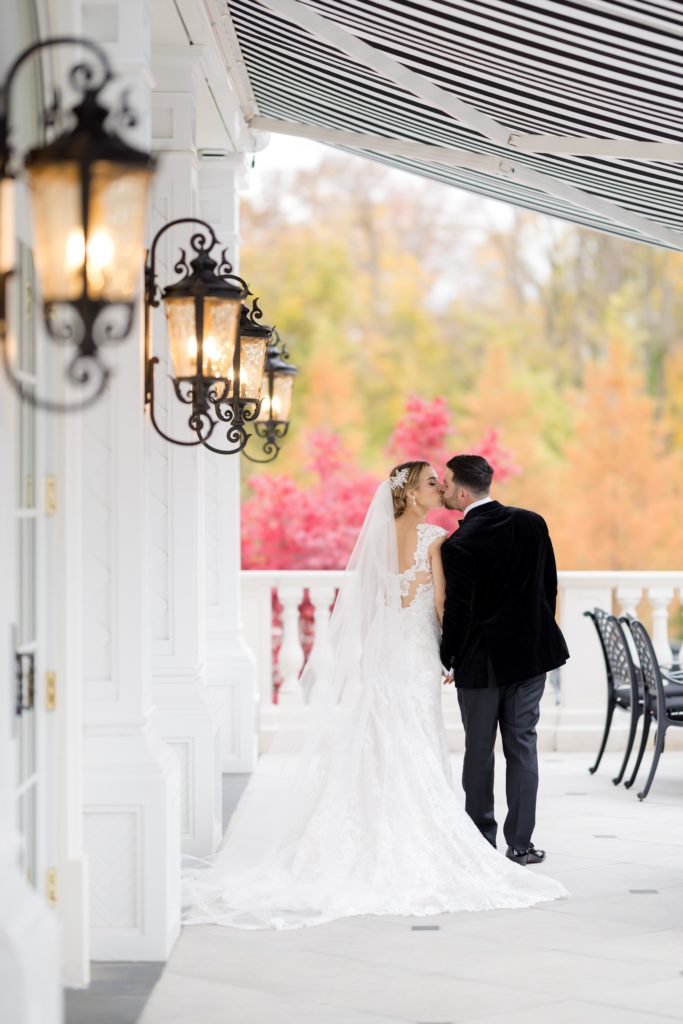 wedding portraits, Maggie Sottero Designs wedding gown, bride and groom kiss, classic tux