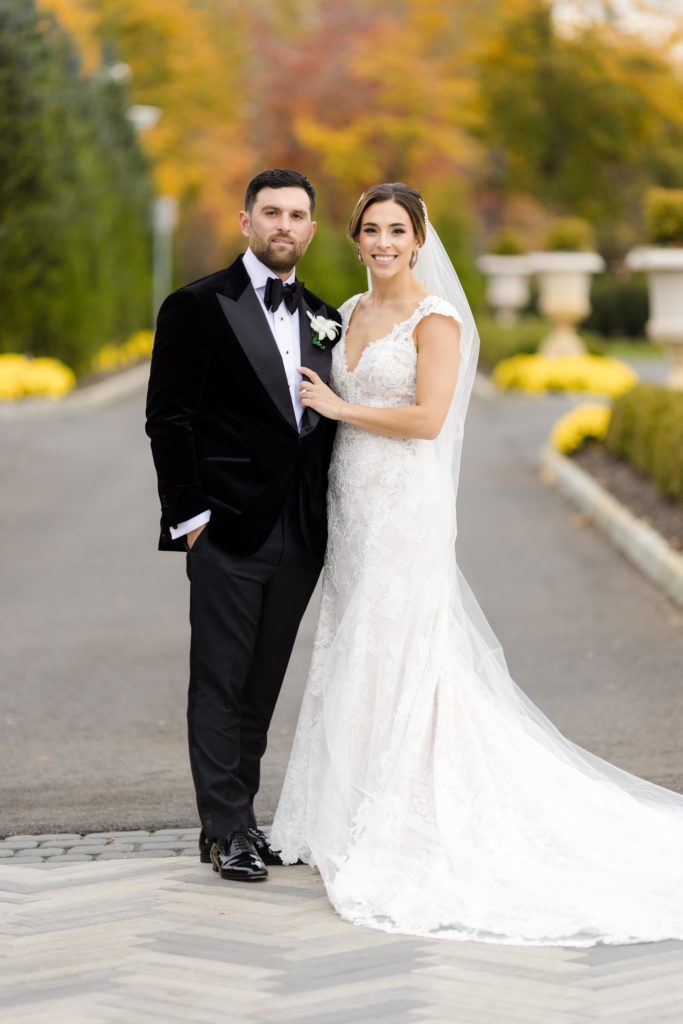 wedding portraits, Maggie Sottero Designs wedding gown, lace-edged veil, classic tux