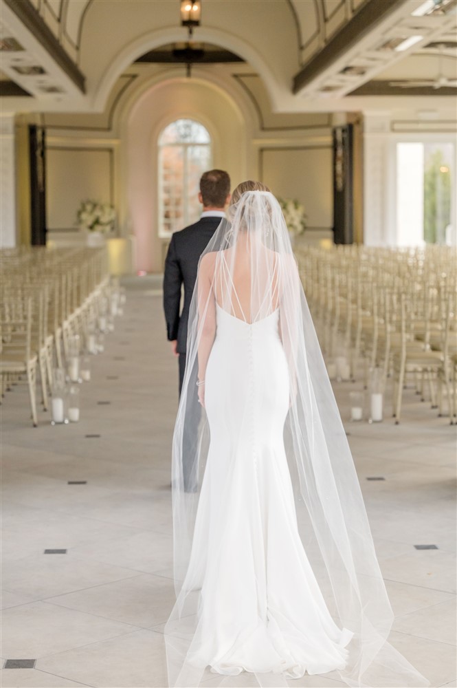 bride walking to groom first look