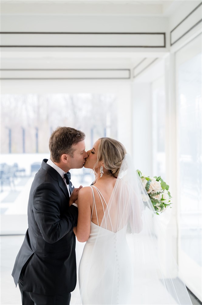 bride and groom kiss