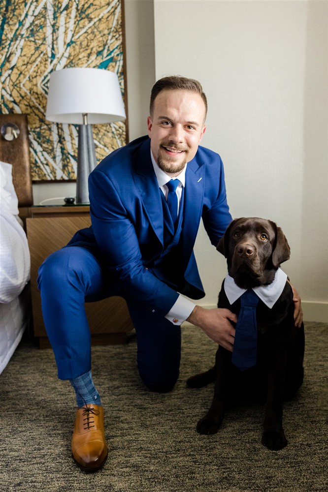 groom and his dog on wedding day