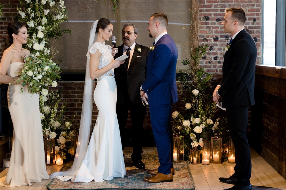 bride and groom saying wedding vows