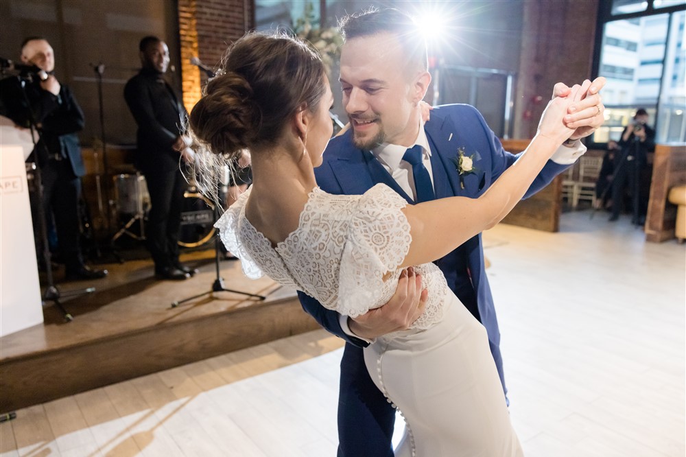 bride and groom dip dancing