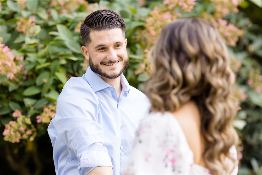 FIANCE LOOKING AT WIFE TO BE ENGAGED COUPLES SAYEN GARDEN